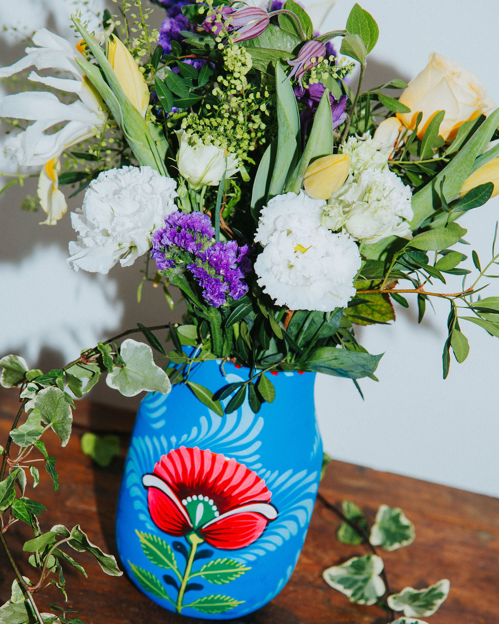 Blue Boyam Vase with a Mixture of Spring Flowers