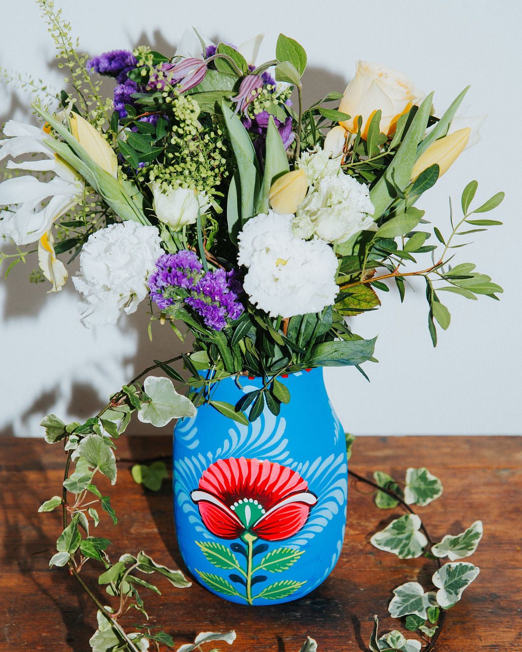 Blue Boyam Vase with a Mixture of Spring Flowers